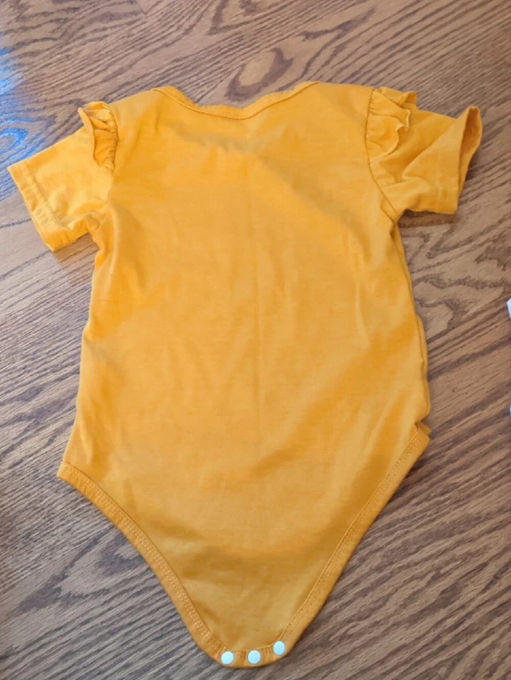Mustard Orange Graphic Onesie with White & Orange Floral Shorts Set